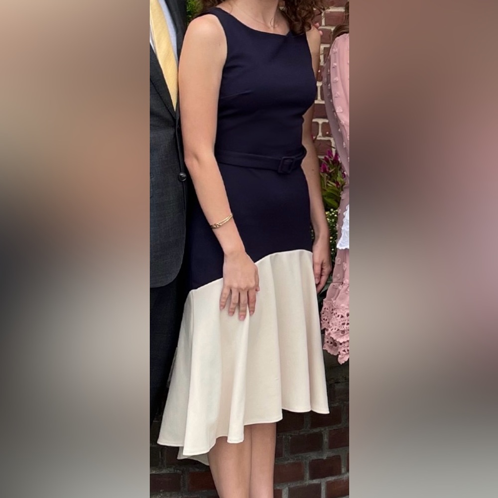 Sleeveless high-low belted dress